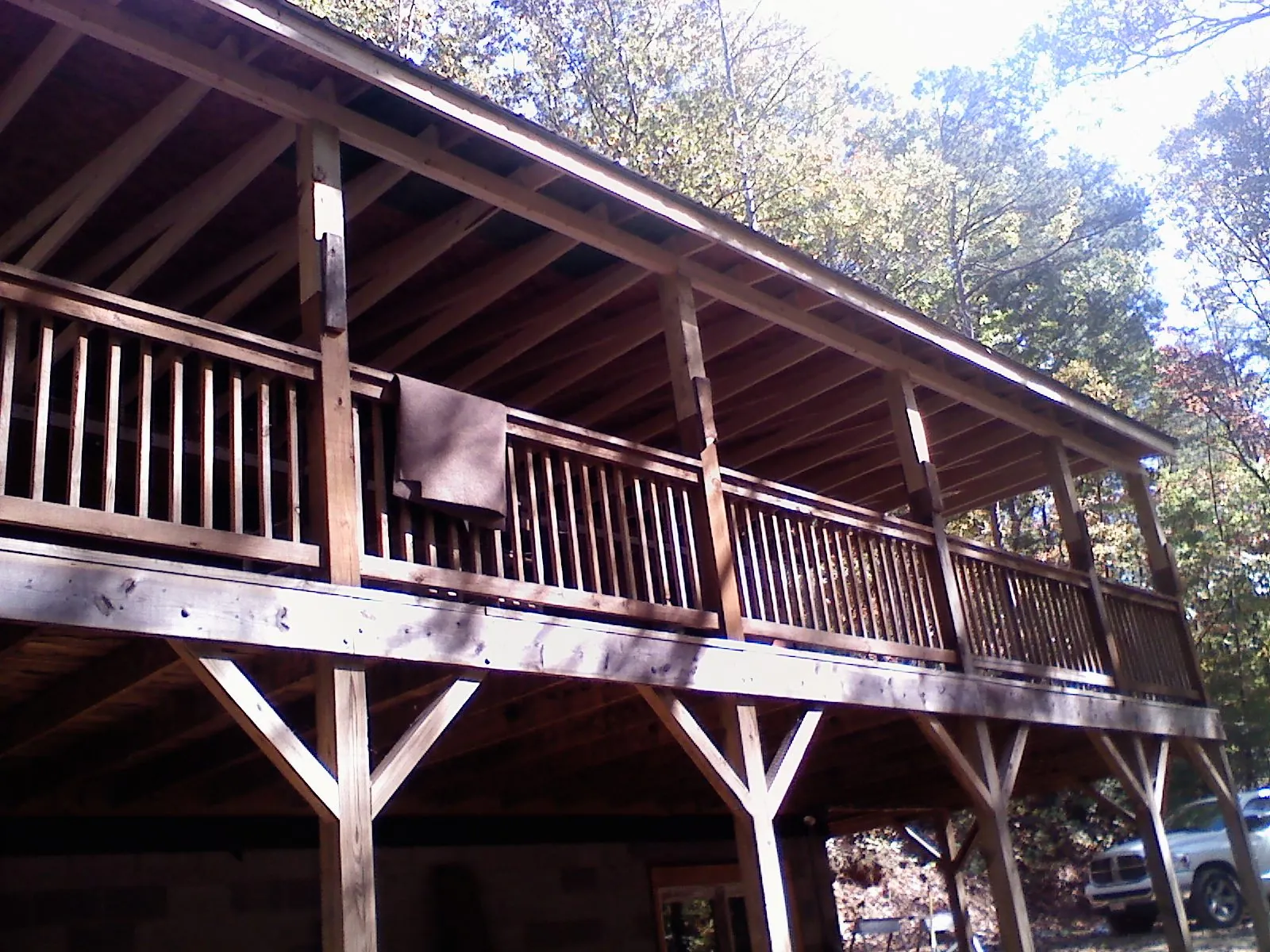 Timber framing under a new elevated porch and deck — Roof Leak Repair in Merrill by Roofing Brothers